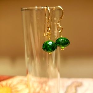 Emerald green color crystal earrings with 18ktgf earring hooks.